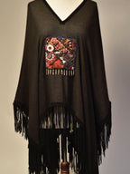 Cashmere/silke-poncho med skinnfrynser Poncho