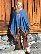 Cashmere/silke-poncho med skinnfrynser